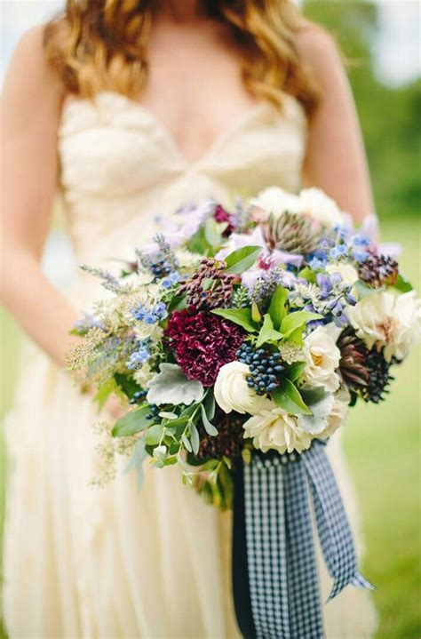 Unique And Beautiful Wedding Bouquet Showcasing Bluepurple