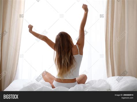 Woman Stretching Bed Image And Photo Free Trial Bigstock