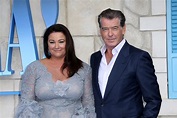 Pierce Brosnan shares a sweet kiss with wife Keely as they celebrate ...