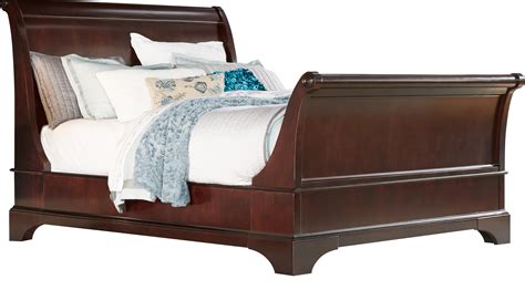 Time to replace that rickety old queen bed frame? Whitmore Cherry 4 Pc Queen Sleigh Bed - Traditional