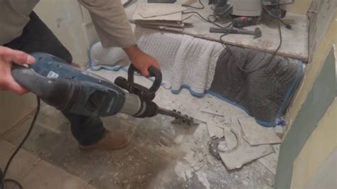 Continue to hammer away at the tiles until you've removed every one and exposed the plywood subfloor. Hammer Drill To Remove Tile | Tile Design Ideas