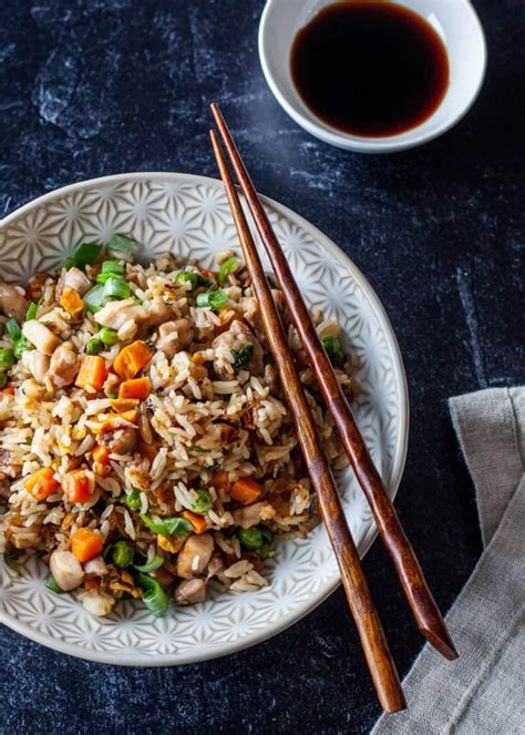 Spicy, tangy, sweet, and addictive better than takeout kung pao chicken is here to brighten up your weeknight (or weekend) dinners! Better Than Takeout Chicken Fried Rice | The Noshery