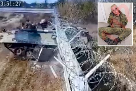 shocking moment drunk russian soldiers smash tank through barb wired metal fence at airport
