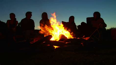 Silhouettes Of People Sitting Around Campfire Stock Footage Sbv