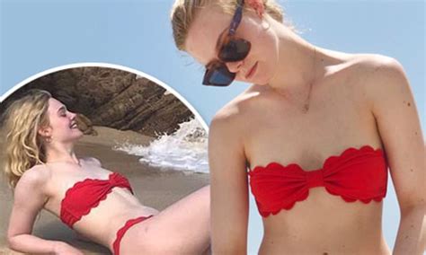 Elle Fanning Flaunts Her Figure In Red Bandeau Bikini While On Vacation In Mexico Daily Mail