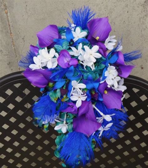 This kind of romantic dynamic between florals can make you feel so. Cascading Bridal Bouquet, Teal, Purple, Blue Hydrangeas ...