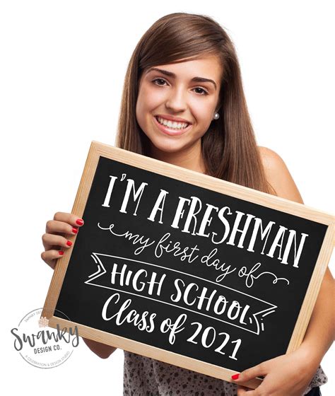 A Woman Holding A Sign That Says Im A Freshman My Best Day Of High
