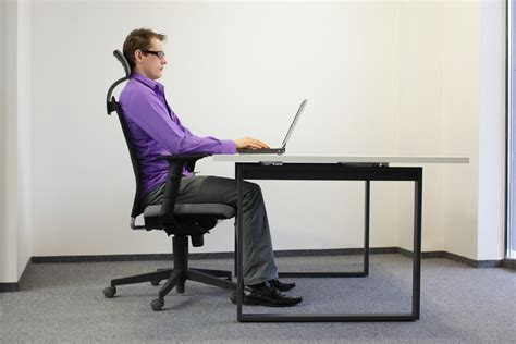 Correct Sitting Position At Workstation Man On Chair Working Wi