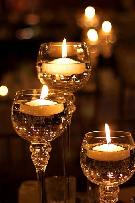Floating Candles In Wine Glasses Pictures Photos And Images For