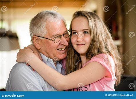 Grandfather And Granddaghter Hug Stock Image Image Of Senior Retired