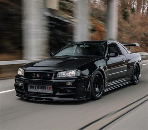 Find great deals on ebay for nissan skyline r34 body kit. Gorgeous Black Nissan Skyline R34 GT-R running on road ...