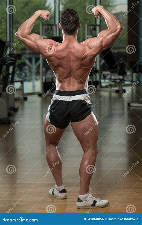 Bodybuilder Performing Rear Double Biceps Pose Stock Photo Image Of