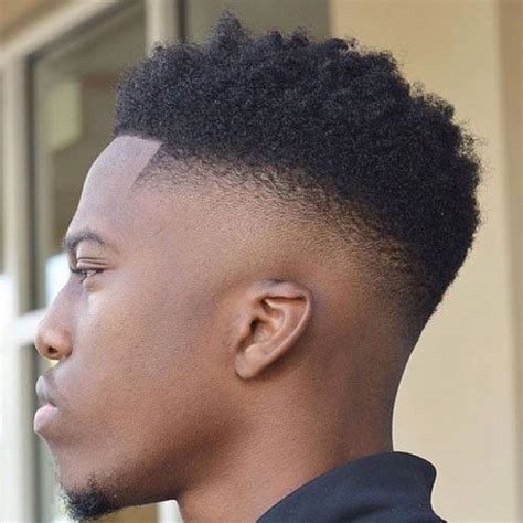 Afro + medium length curls. Afro Taper Fade Haircut | Men's Hairstyles + Haircuts 2017