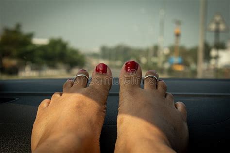 Woman Feet In With Nail Polish On Car Dashboard Relaxed Passenger