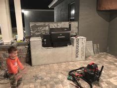 These smokers draw the smoke and heat directly upwards through the cooking racks. Outdoor kitchen for the Traeger pellet grill! We custom ...