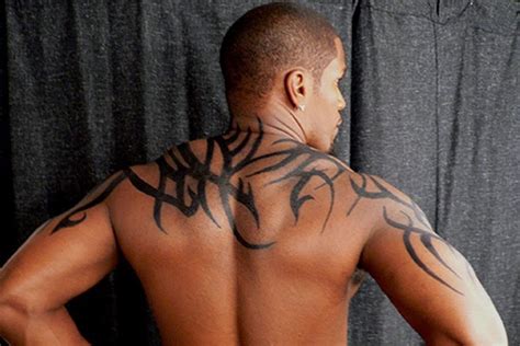 There is an ongoing lawsuit between between warner bros. Jamie Fox Tattoos - Celebrities Tattooed