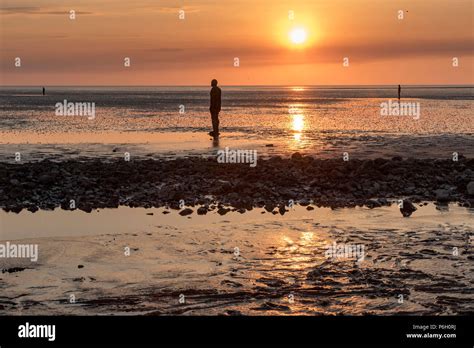 Sunset Crosby Beach Liverpool North West England Antony Gormley