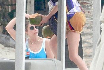 Ashley Benson Cara Delevingne Caught By Paparazzi Tanning In Bikini PlayCelebs Net