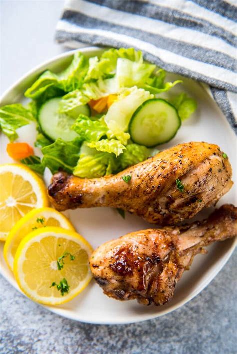 Meal prep pesto chicken & veggies. Lemon Herb Grilled Chicken Drumsticks - Garnished Plate