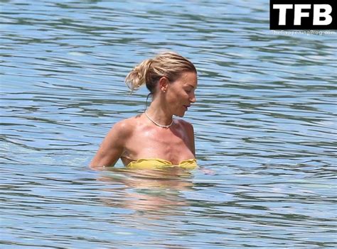 Carly Parker Is Seen In A Yellow Bikini On The Beach 25 Photos