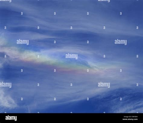 Rainbow Of Ice Crystals In Cloud Formation Stock Photo Alamy