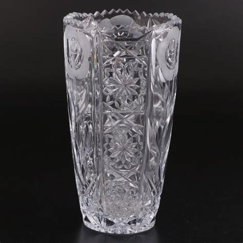 American Brilliant Style Pinwheel Cut Crystal Vase And Floral Pressed Glass Vase Ebth