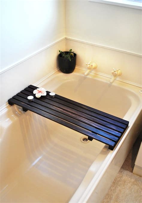 But this bathtub tray also functions as a command center when you're taking a relaxing bath; DIY Kiwi: How to build a timber bath caddy