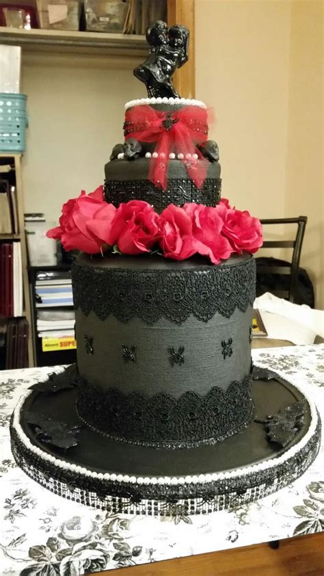 Fake Wedding Cake Made With Different Sized Containers Glued Together
