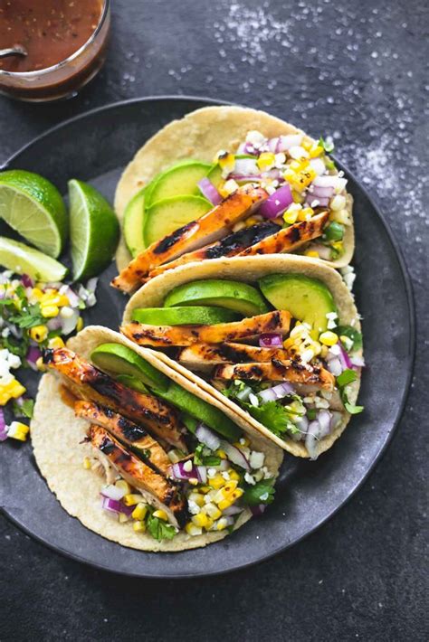 Grill over moderately high heat, turning occasionally, until the chicken is lightly charred and cooked through, about 15 minutes. Mid Week Dinner Recipe: Grilled Organic Chicken Tacos ...