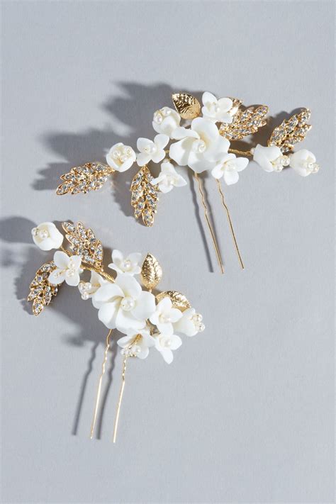 A wide variety of floral oil perfum options are available to you, such as scent, fragrance type, and usage. IVORY FLORAL HAIR PINS | Vow'd Weddings