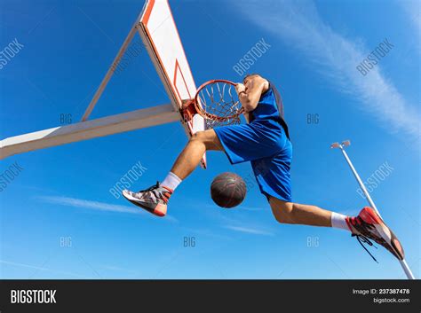 Maybe you would like to learn more about one of these? Slam Dunk. Side View Image & Photo (Free Trial) | Bigstock