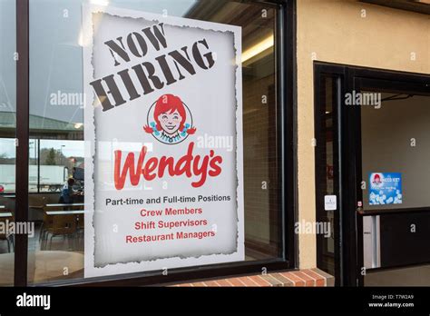 HUDSON, WI/USA - APRIL 25, 2019: Now Hiring sign at Wendy's restauraunt