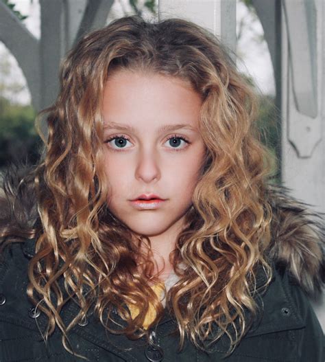Child Actress With Brown Curly Hair