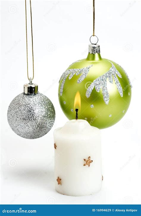 Christmas Baubles And Candle On A White Background Stock Image Image
