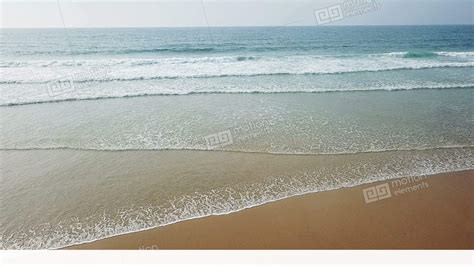 Aerial View Of Ocean Waves And Beautiful Beach In Slow