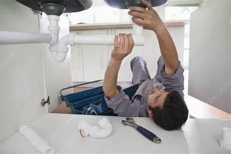 Plumber Working On Pipes Stock Image F0137889 Science Photo Library