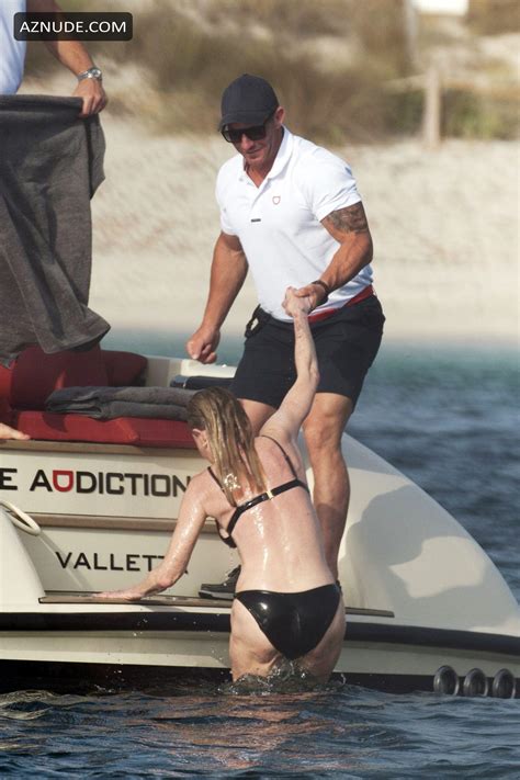 Melanie Griffith Sexy Enjoys A Day By The Sea And On A Luxury Yacht With Friends In Formentera