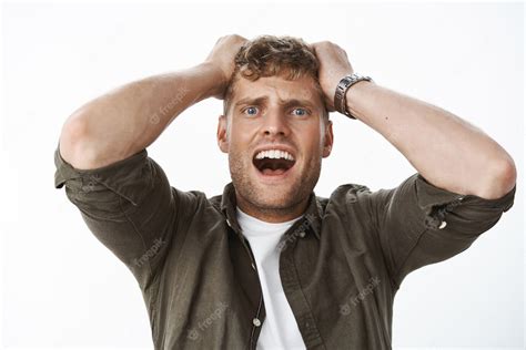 Free Photo Intense Shocked Guy In Stupor With Blue Eyes And Fair Hair