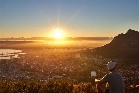 Young Guy Watching The Sunrise Over The City Stock Photo Image Of