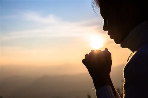 Woman Praying In The Morning On The Sunrise Background Christianity