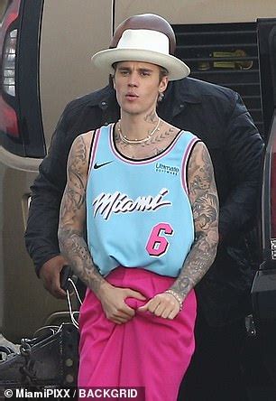 From youth nba jerseys available in swingman, throwback and custom styles to kids hats,. Justin Bieber sports striking red ensemble while shooting ...