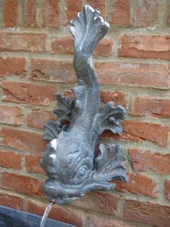 Beeson decorative trained staff is ready to assist you with your selection of plumbing fixtures. Dolphin Fountain Spout | Lead Masks, Spouts, Fountains and Wall Plaques - Nidderdale Lead, UK ...
