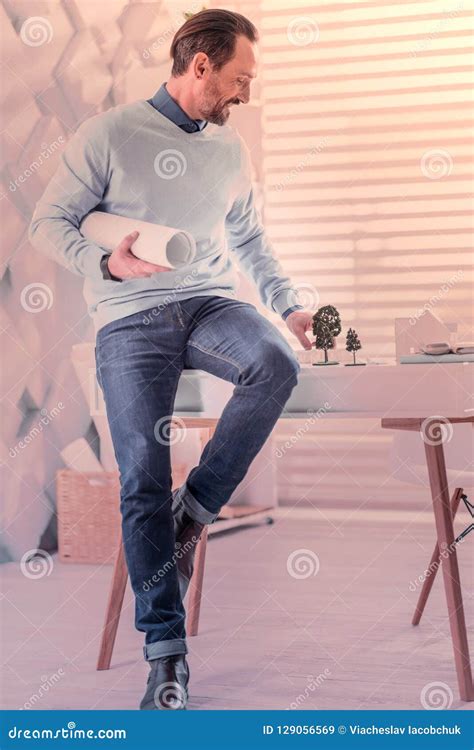 Joyful Brunette Man Sitting On The Table Stock Image Image Of Emotions Create 129056569
