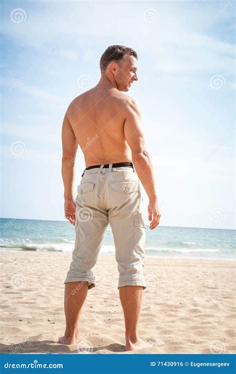 Barefoot Man Stands On Sandy Summer Beach Stock Photo Image Of Relax Body