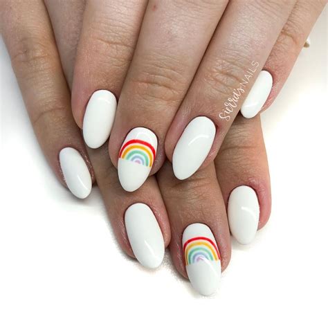 13 rainbow nail art ideas to try during pride month and beyond rainbow nails rainbow nail art