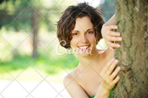Girl Hiding Behind Tree Photos By Canva
