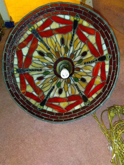 A lot of linen, heavy tapestry styled fabric that nearly blocked out all the light, paper, glass and metal. Vintage Dragonfly Stained Glass Lamp Shade | Collectors Weekly