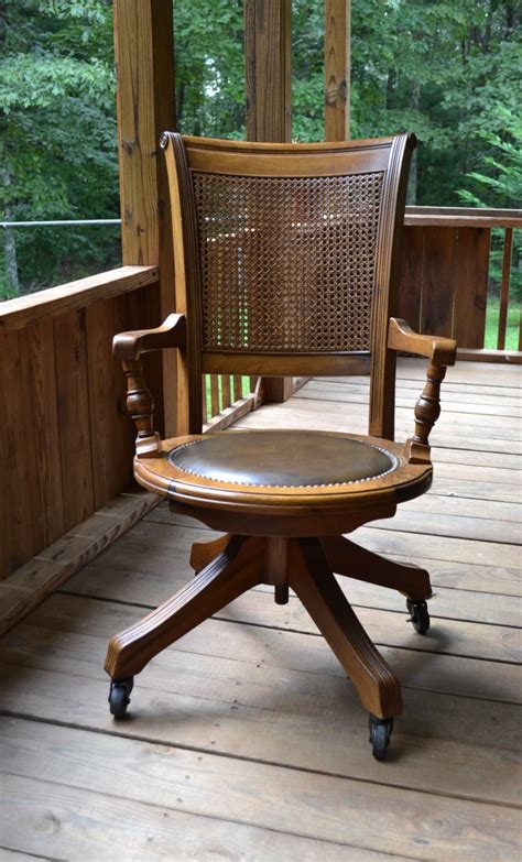 Vintage Wood Oak Office Chair Swivel Wheels Cane Back Vinyl Etsy