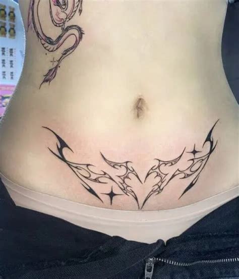 25 Womb Tattoos Symbolizing The Miracle Of Creation