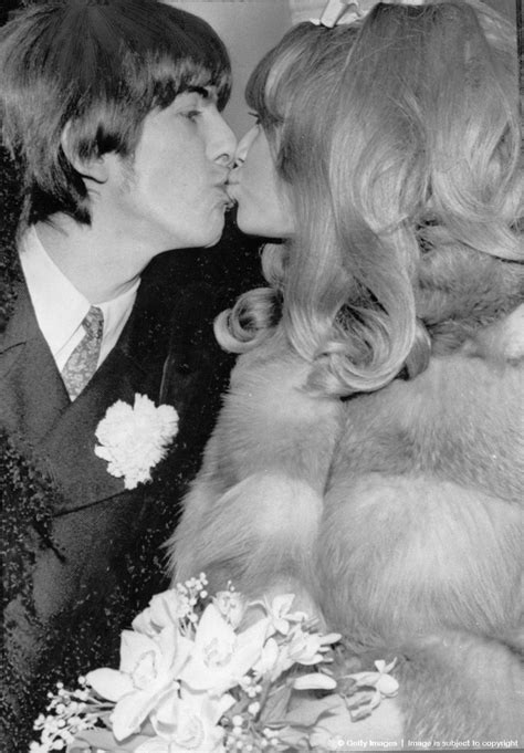 JANUARY 22 1966 Beatle George Harrison And Bride Pattie Boyd Kissing